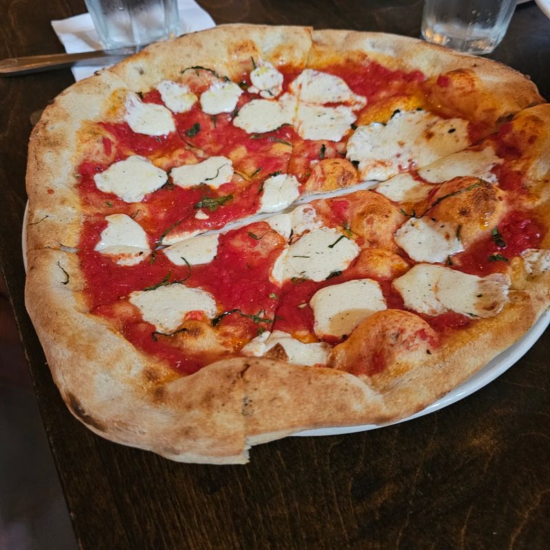 Wood-Fired Pizza With Puffy Charred Crust Wood-Fired Pizza With Puffy Charred Crust
