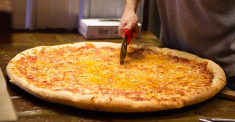 The Mouthwatering Pizza Slices At This Pennsylvania Restaurant Are Literally Too Big For One Plate