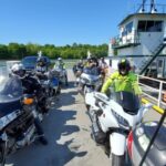 This Old-Fashioned Tennessee Ferry Still Carries Cars Across The River For 75 Cents