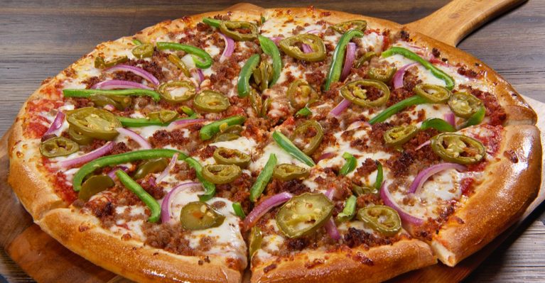 This Popular Texas Pizzeria Still Serves Surprisingly Cheap Pizza In 2026