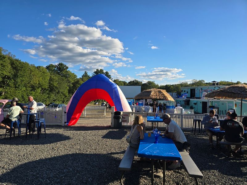 A Cozy Beer Garden With Fire Pits Adds To The Fun