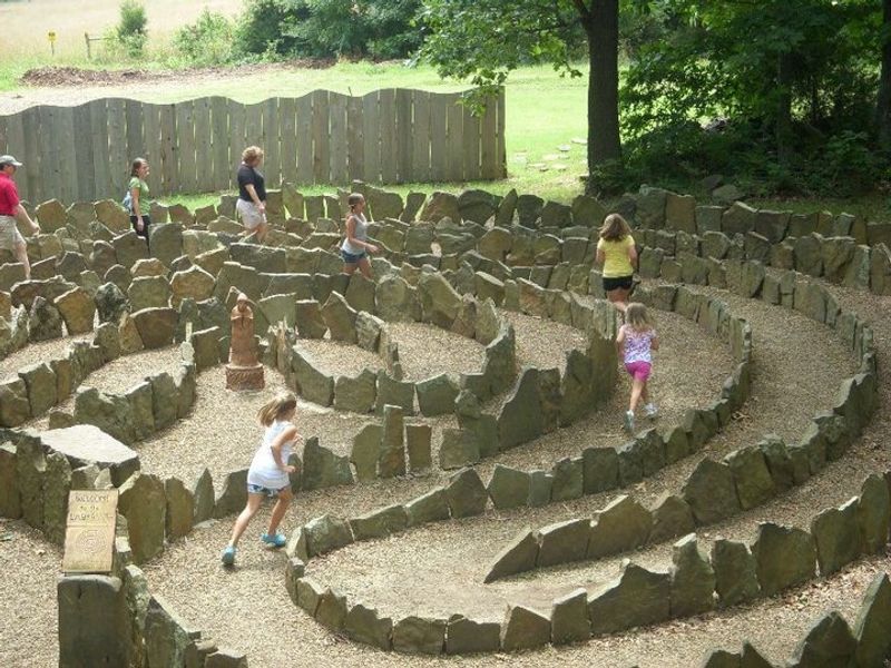 A Labyrinth, a Maze and Oversized Games