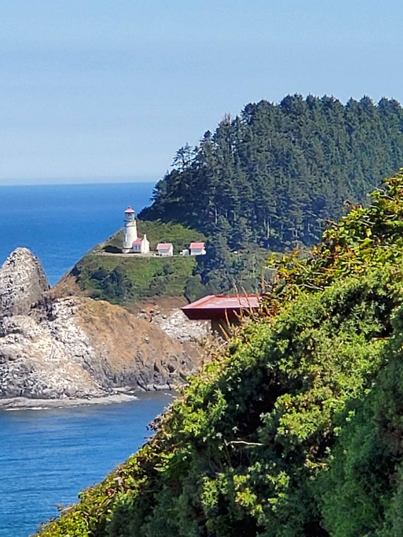 A Lighthouse Framed by the Cave