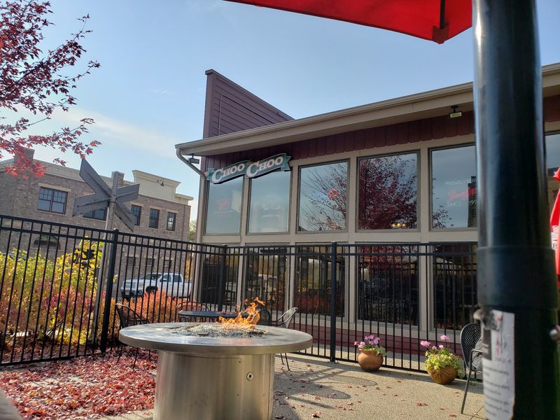 An Outdoor Patio With a Fire Pit