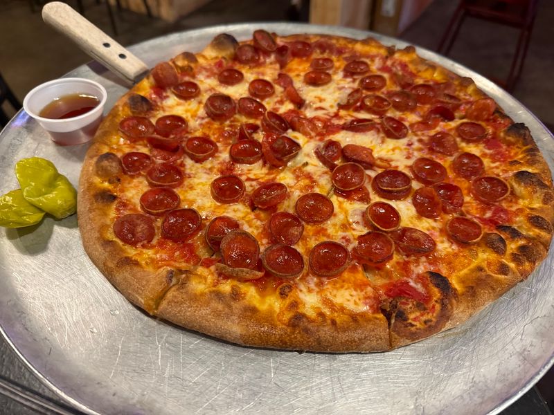 Coal-Fired Heat Gives the Crust Its Signature Char Coal-Fired Heat Gives the Crust Its Signature Char