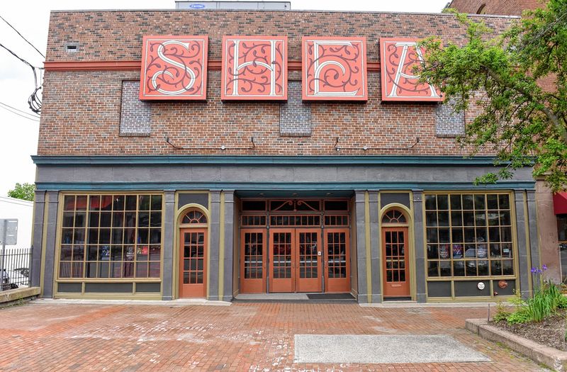 Movies, Music, And Art Hide Behind Old Brick Walls
