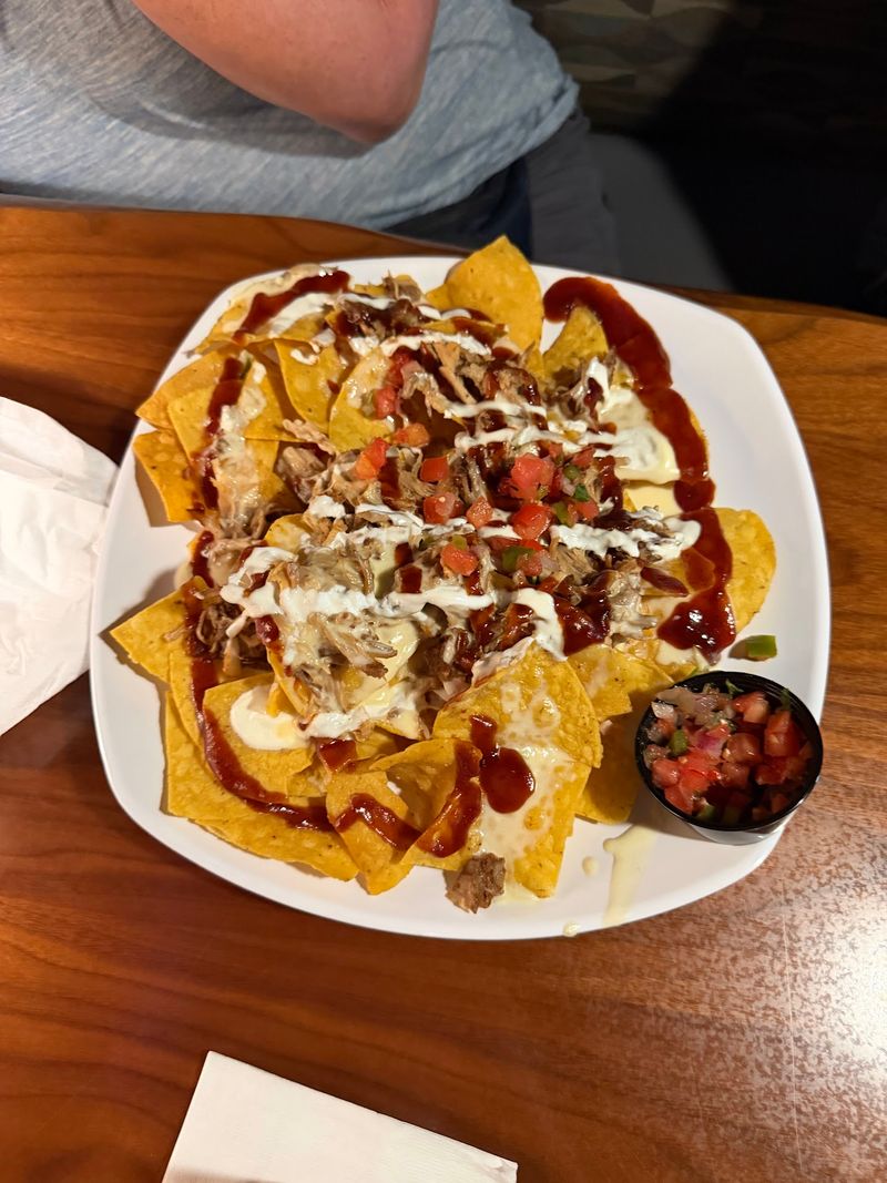 Pulled Pork Nachos Start The Meal With A Crowd-Pleasing Favorite Pulled Pork Nachos Start The Meal With A Crowd-Pleasing Favorite