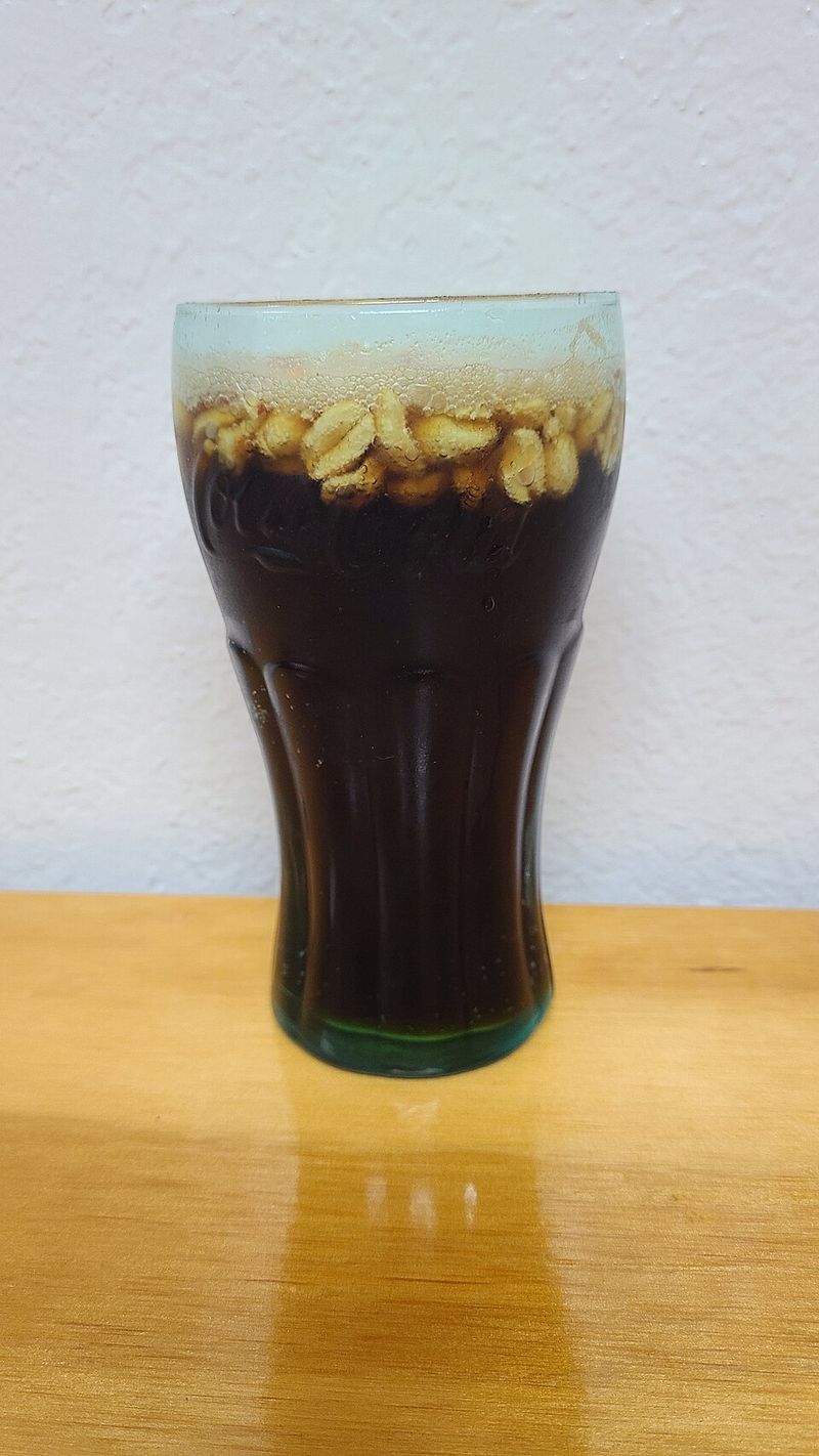 Putting Peanuts in Coca-Cola Putting Peanuts in Coca-Cola
