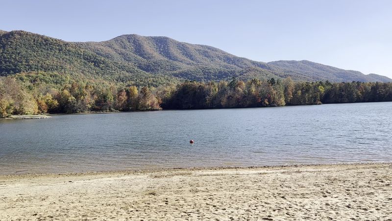 A Sandy Mountain Beach Waits Beside The Trail