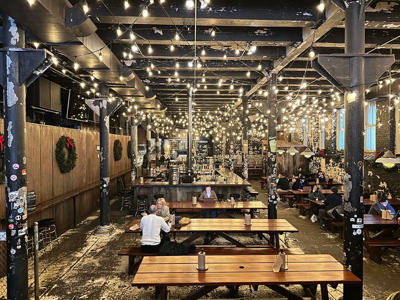 String Lights and Picnic Tables Make It Feel Like a Giant Backyard String Lights and Picnic Tables Make It Feel Like a Giant Backyard