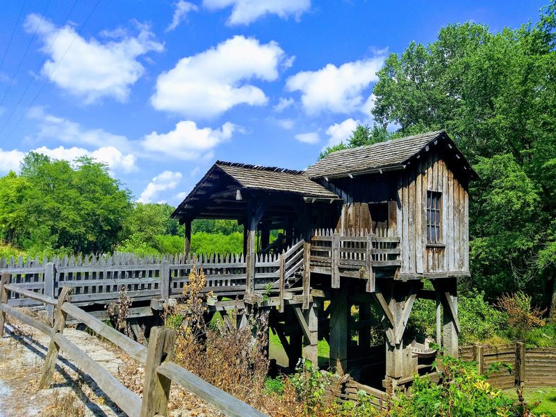 More Than 20 Log Buildings Wait Down the Path