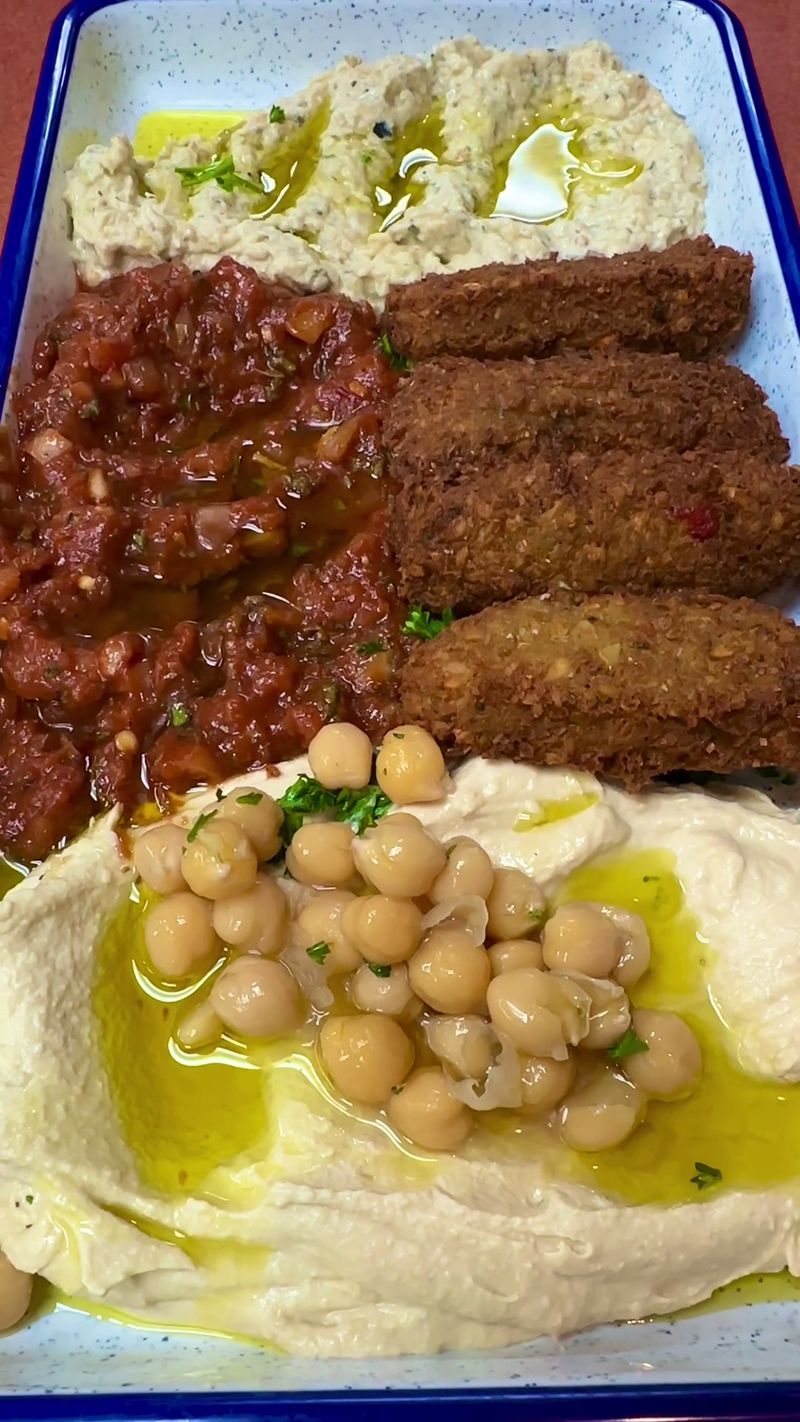 Your Table Needs A Spread Of Dips And Falafel