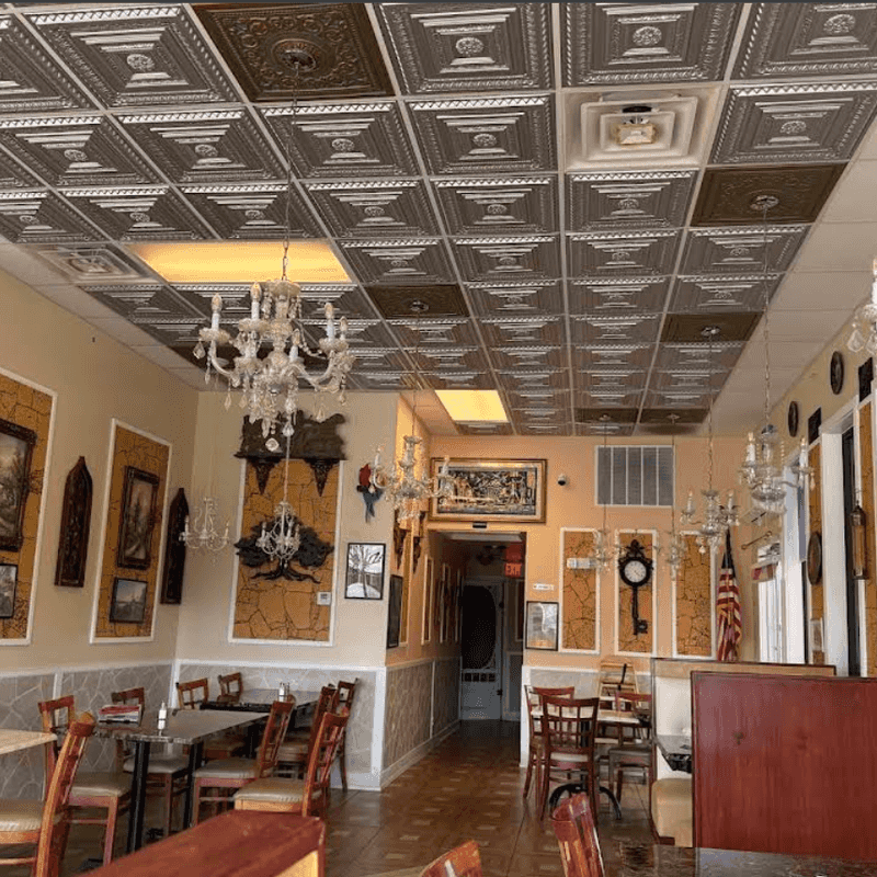 Old-World Charm Fills This Cozy Mom-and-Pop Dining Room Old-World Charm Fills This Cozy Mom-and-Pop Dining Room
