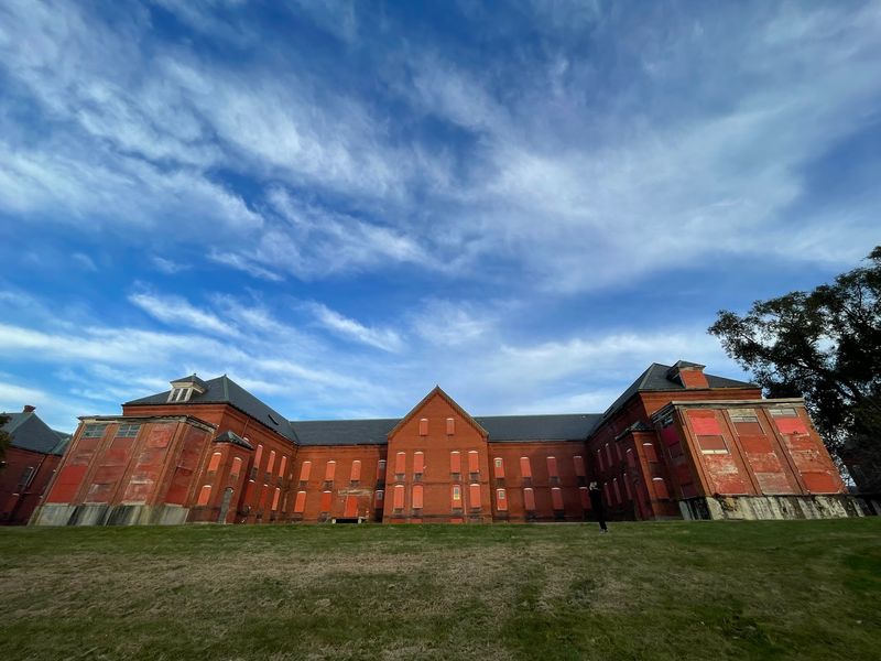 Daytime Strolls Turn Eerie After Sunset at This Abandoned Massachusetts Hospital