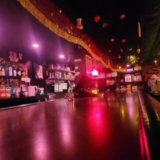 Beneath Downtown Tulsa Sidewalks, Red Lights And Velvet Drapes Lead Into A Dive Bar From Another Century