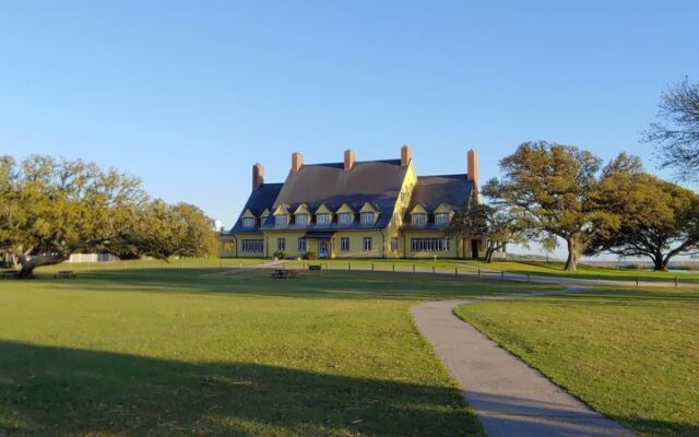 This North Carolina Mansion Day Pairs A 1920s Estate, 220 Lighthouse Steps And Wild Horses
