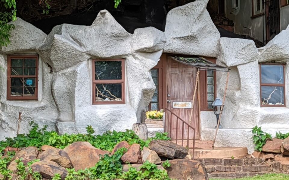 Behind The Melted Stone Walls Of This Storybook Tulsa House Sits A Hand-Built Speakeasy