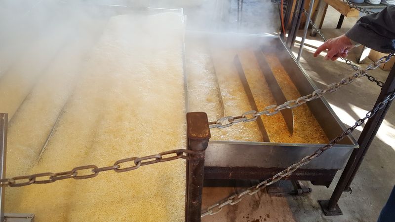 The Juice Slowly Thickens Inside A Traditional Evaporator Pan
