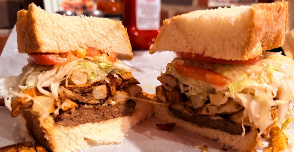 Pittsburgh Locals Love The Overstuffed Sandwiches Stacked With Fries At This Pennsylvania Strip District Spot