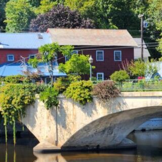 This Massachusetts Town Turned An Old Trolley Bridge Into A Beautiful Flower Garden