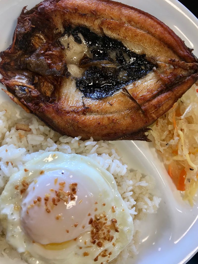Breakfast Plates With Garlic Rice and a Fried Egg